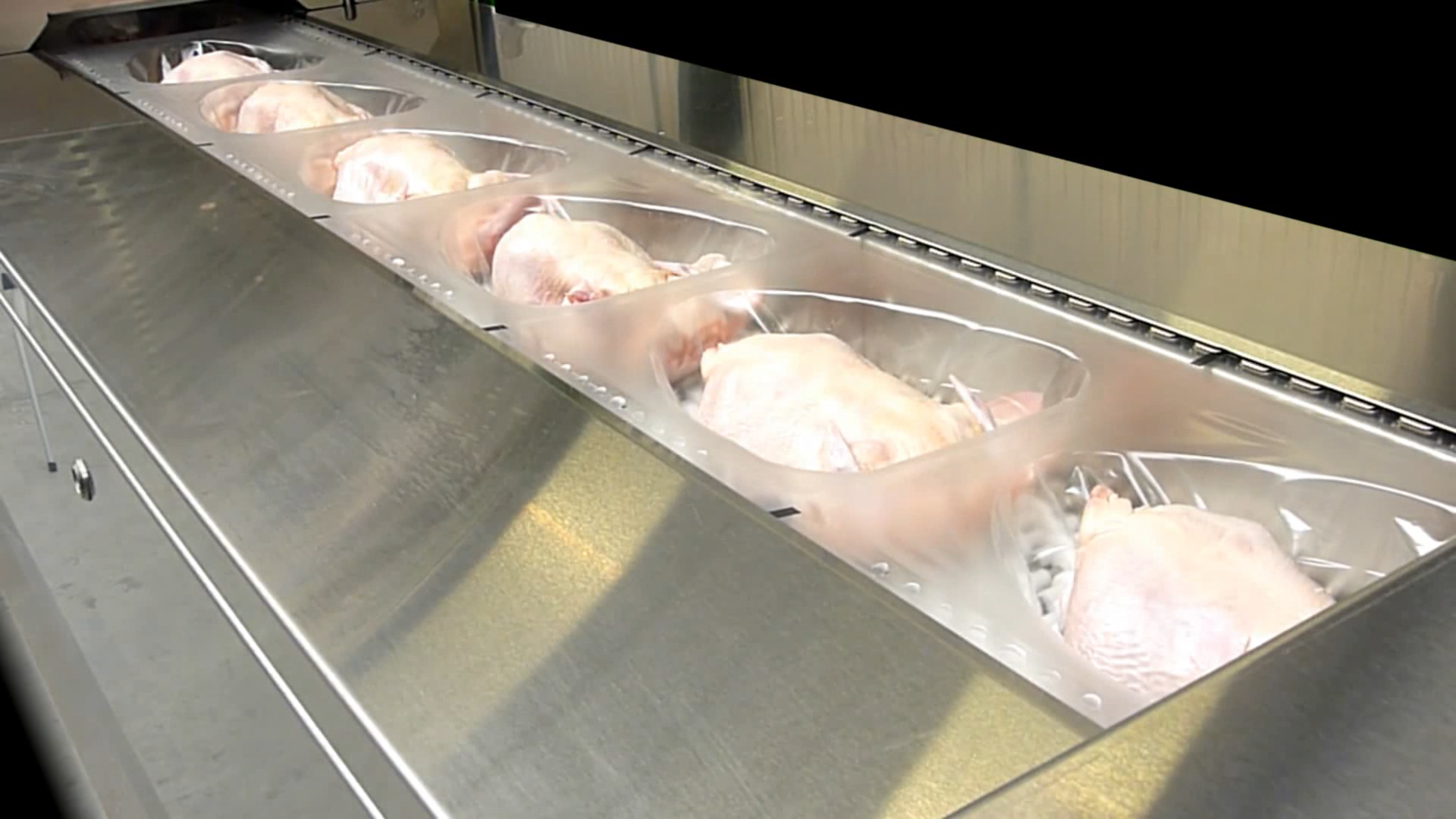 Poultry packaging machine